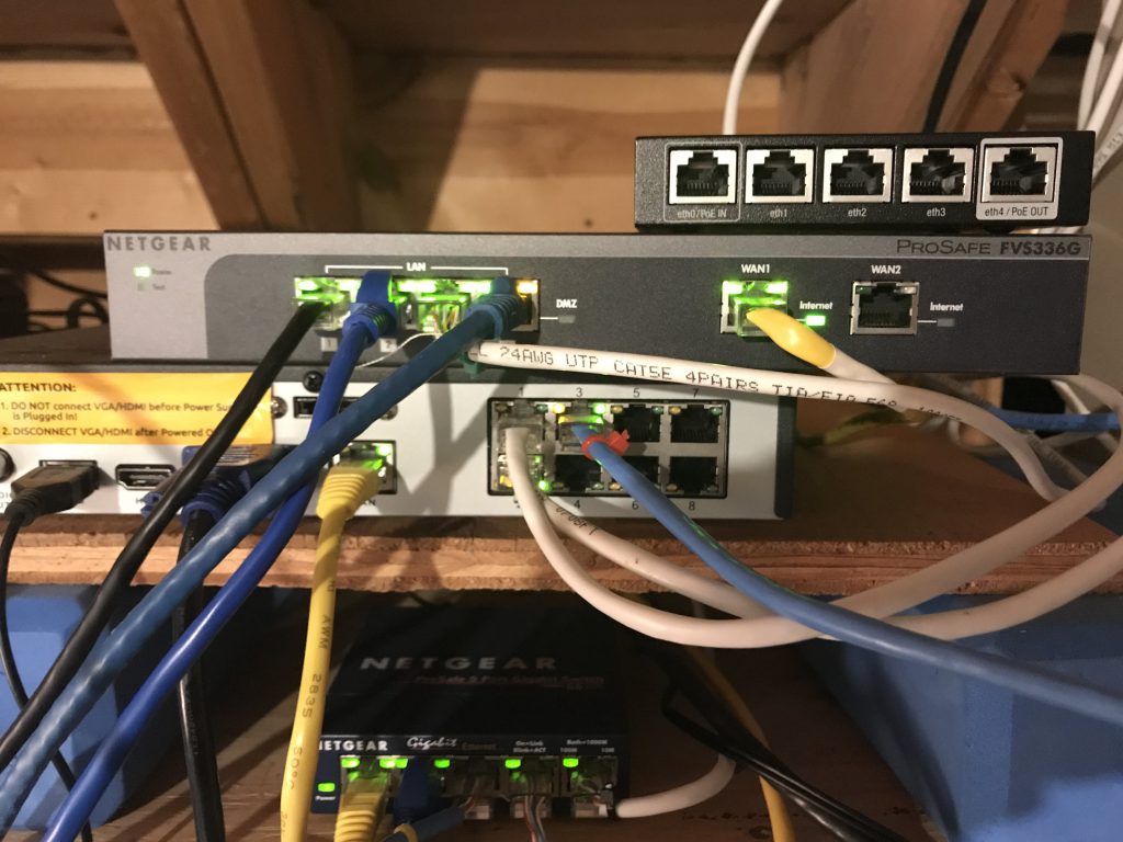 From the top - EdgeRouter X, Netgear FVS336G, security camera NVR, and a Netgear switch. Not pictured is the Wifi AP & a couple more runs of cat-5e.